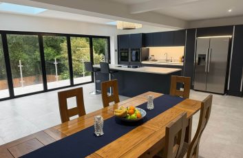 07 Completed - open-plan kitchen and dining with bifolds (HERO)